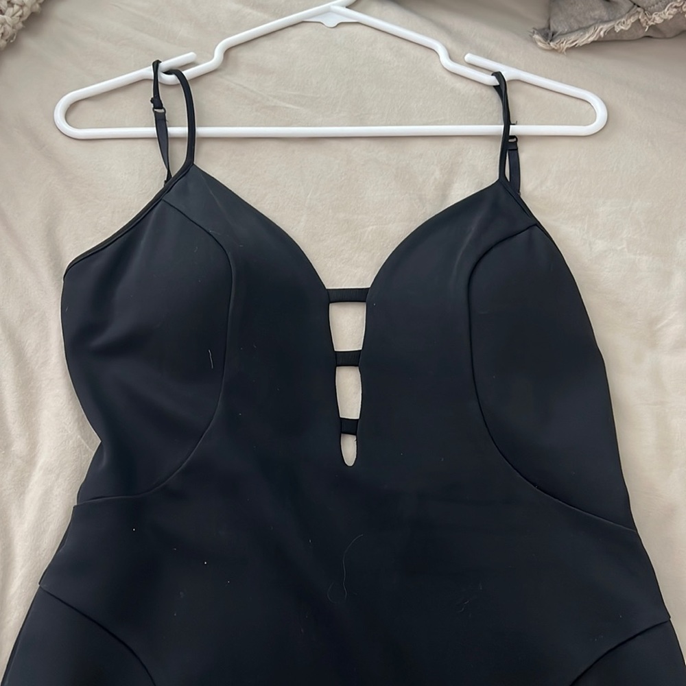 Only worn once Bebe Medi black dress with a mesh back